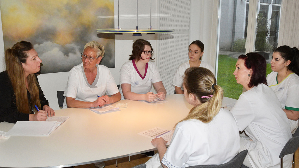 Pflegeteam von Convenio Gelsenkirchen bei der Teambesprechung